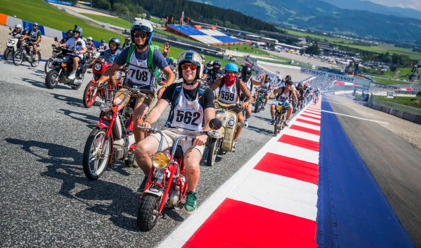 Cruising the Red Bull Ring on your 50cc moped (yes, the tiny, buzzing kind)!